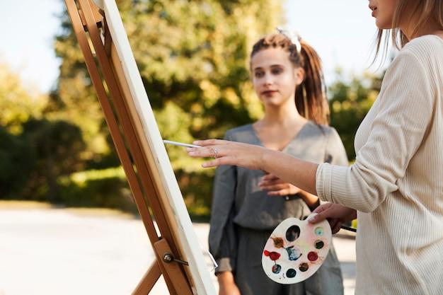 Female artists outdoors